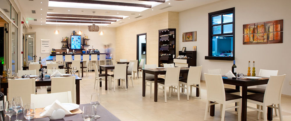 Delfini Beach Hotel & Suites Archangelos  Exterior photo